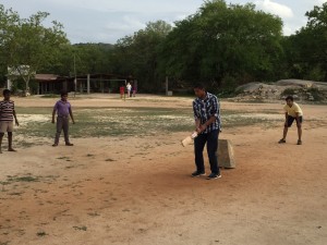 Kyre trying cricket at Rishi Valley